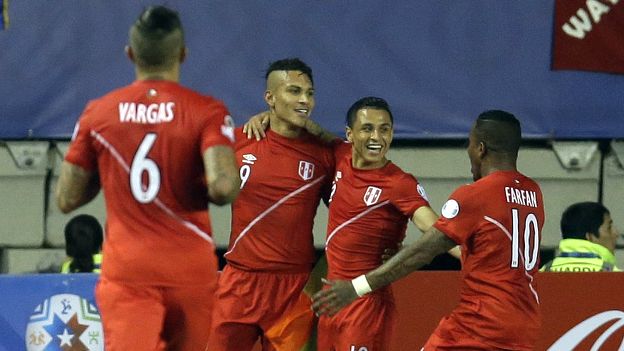 Peru's Jose Paolo Guerrero, second from left, celebrates with teammates after scoring his team's second goal during a Copa America quarterfinal soccer match against Bolivia at the German Becker Stadium in Temuco, Chile, Thursday, June 25, 2015. (AP Photo/Natacha Pisarenko)