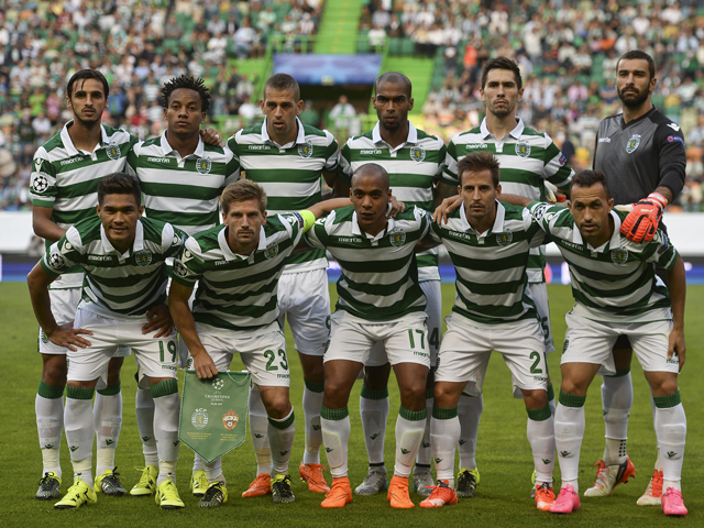 Sporting's team (from L-R) on top Sporting's Costa Rican forward Bryan Ruiz, Sporting's Peruvian forward Andre Carrillo, Sporting's Algerian forward Islam Slimani, Sporting's Brazilian defender Naldo, Sporting's defender Paulo Oliveira and Sporting's goolkeeper Rui Patricio and down Sporting's Colombian forward Teofilo Gutierrez "Teo", Sporting's midfielder Adrien Silva, Sporting's midfielder Joao Mario, Sporting's defender Joao Pereira and Sporting's Brazilian defender Jefferson Nascimento, pose for a family photo moments before the UEFA Champions League play off football match Sporting Portugal vs CSKA Moscow at the Jose Alvalade stadium in Lisbon  on August 18, 2015.  AFP PHOTO / PATRICIA DE MELO MOREIRA